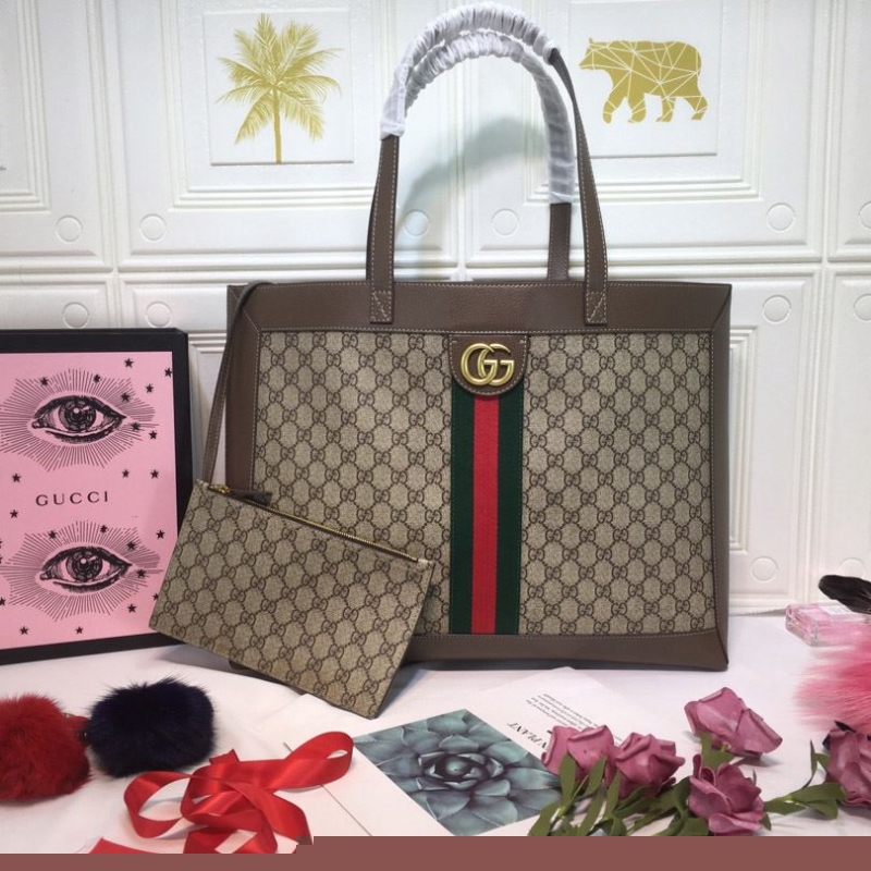 G*u*i shopping bags